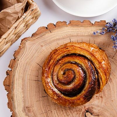 Улитка с корицей в Много хлеба по цене 98 ₽