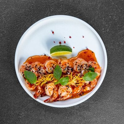 Тигровые креветки в кисло-сладком соусе в Merzen по цене 910 ₽