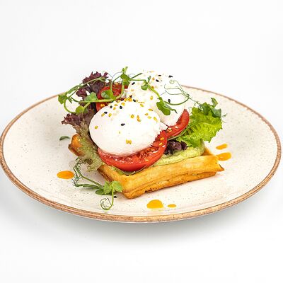 Бельгийская вафля с пюре из авокадо и яйцами пашот в Kitchen по цене 820 ₽