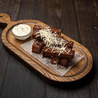 Гренки чесночные в Прожар по цене 480 ₽