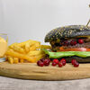 Черный фирменный бургер Мустанг в Mustang Lounge Cafe по цене 590