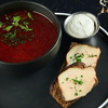 Борщ с копченой конской гривой, сметаной и зеленым луком в Level kitchenbar по цене 590