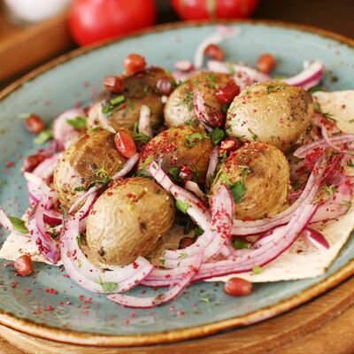 Картофель на мангале в Шик Шашлык по цене 370 ₽