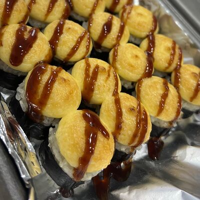 Запеченный ролл с мидиями в Pizza life по цене 336 ₽