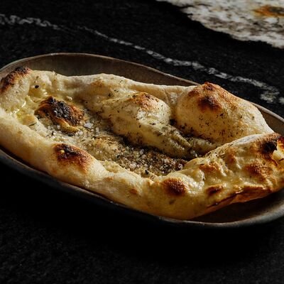 Лепёшка Заатар в Maya по цене 290 ₽