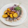 Закуска из сельди слабой соли с молодым картофелем в Лебовски Пицца и Боулинг по цене 460