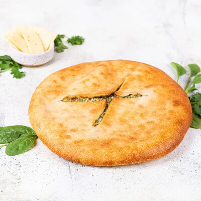 Пирог Осетинскийс сыром и зеленью в У Палыча. С пылу, с жару! по цене 648 ₽