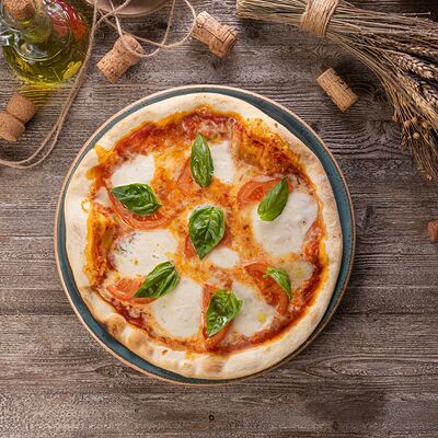 Пицца Капрезе в Extra Virgin по цене 770 ₽