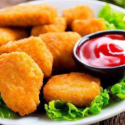 Наггетсы из натурального куриного филе в Пицца мигом по цене 469 ₽