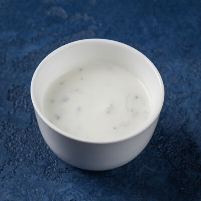 Мацони с чесноком и зеленью в Дзеими по цене 88 ₽