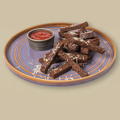 Гренки из бородинского хлеба с пармезаном в Любим сытно по цене 545 ₽