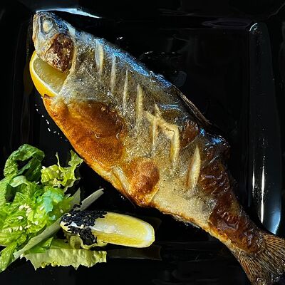 Радужная форель запеченная в Карасёвня по цене 1100 ₽