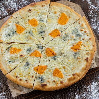 Пицца 4 сыра в Темерницкий по цене 950 ₽