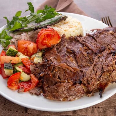 Донер говяжий на тарелке в Ankara Cafe по цене 400 ₽