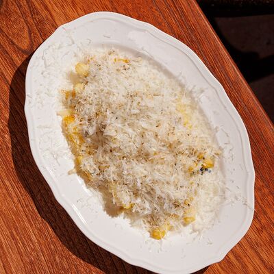 Картофель фри с трюфелем и пармезаном в TiAMA по цене 550 ₽