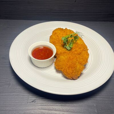 Куриный шницель с грибным соусом в Полнолуние по цене 550 ₽