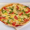 Пицца с курицей и томатами в Parmesan по цене 710