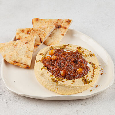 Хумус с томленой говядиной в Shulman Kitchen по цене 650 ₽