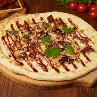 Пицца с рваной свининой и рёбрами в Bullet Bar по цене 900 ₽