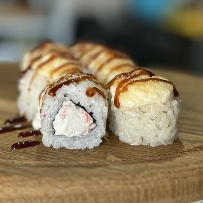 Запеченный с крабом в ГансРолл по цене 420 ₽