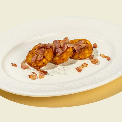 Картофельные крокеты с беконом и сметаной в Сицилия по цене 460 ₽