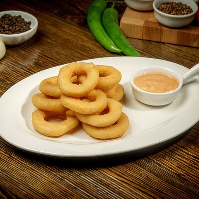 Луковые кольца с соусом кимчи в Пловная по цене 200 ₽