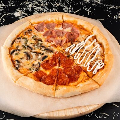 Пицца Четыре сезона в РАХАТ по цене 750 ₽