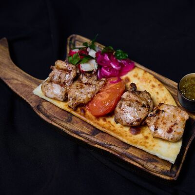 Куриные бедра на гриле в Эндорфин по цене 790 ₽