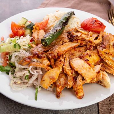 Донер куриный на тарелке в Ankara Cafe по цене 350 ₽