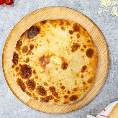 Пирог осетинский с сыром в Старый Ереван по цене 985 ₽