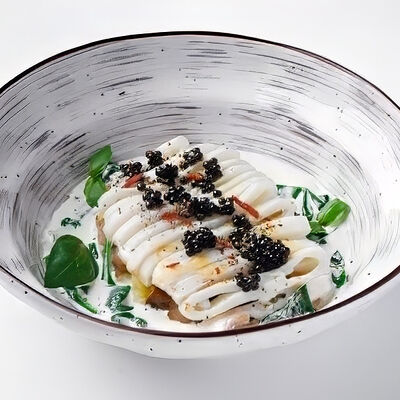 Кальмар с соусом из анчоусов и печёным картофелем в iL Патио по цене 26 р.