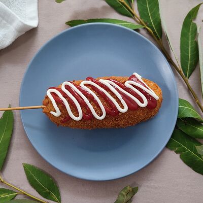 Корн-дог Чиз-сосиска в Кафе тайской еды по цене 290 ₽