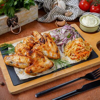 Куриные крылышки на углях в СМАК Раменки по цене 770 ₽