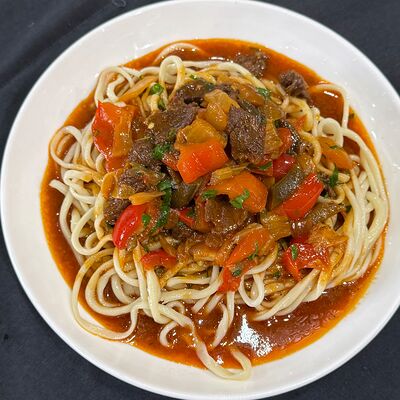 Лагман уйгурский в Чойхона Хаким Ака по цене 440 ₽