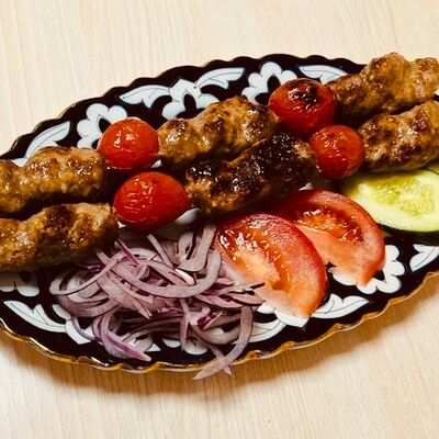 Люля-кебаб с помидорами в Чайхана Файзабад по цене 549 ₽