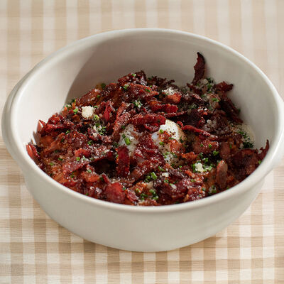 Овсянка аль помодоро с беконом и яйцом пашот в Bshushu по цене 850 ₽