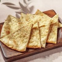 Фокачча с кунжутом и оливковым маслом в Перчини на огне