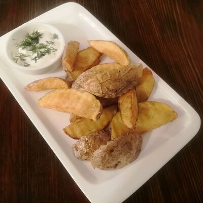 Картофель по-деревенски в Очаг по цене 170 ₽