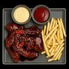 Килограммовое плато хрустящих куриных крылышек в Black Monkey по цене 850