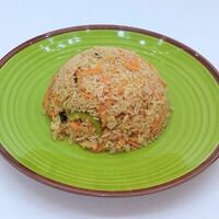 Вегетарианский обжаренный рис в Banana Leaf