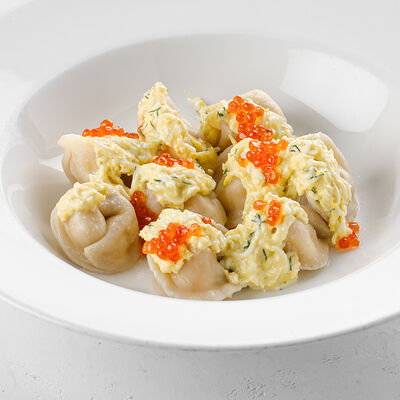 Пельмени с морепродуктами и соусом по-польски в Волга-Волга по цене 1190 ₽