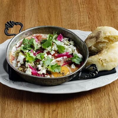 Шакшука с фетой и печеным перцем в Lucky Duck по цене 650 ₽