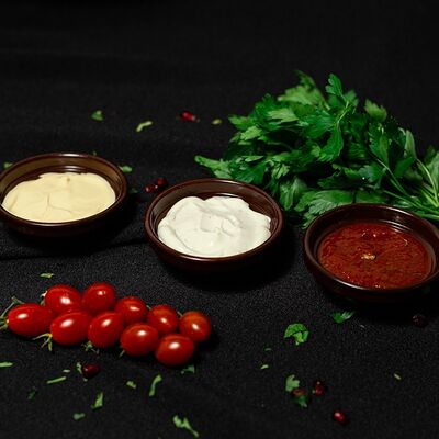 Чесночный соус в Proкебаб по цене 52 ₽