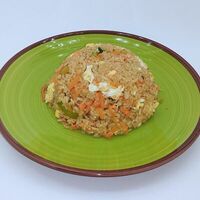 Обжаренный рис с яйцом в Banana Leaf