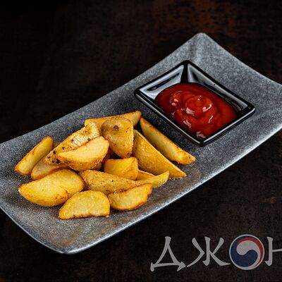 Картофель по-деревенски в Джонга по цене 250 ₽