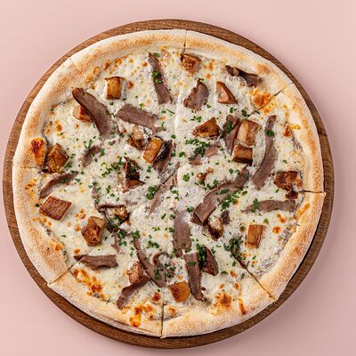 Пицца с копчёной уткой и грибами в Avgust13 по цене 1350 ₽