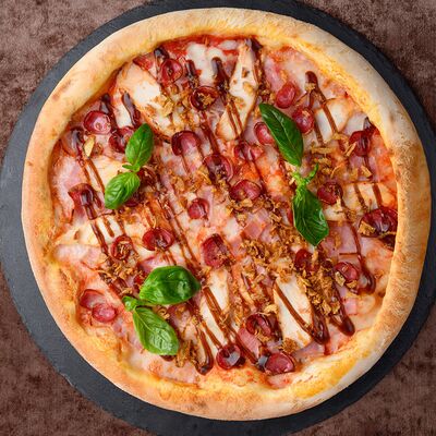 Пицца мясная в Chento по цене 1080 ₽