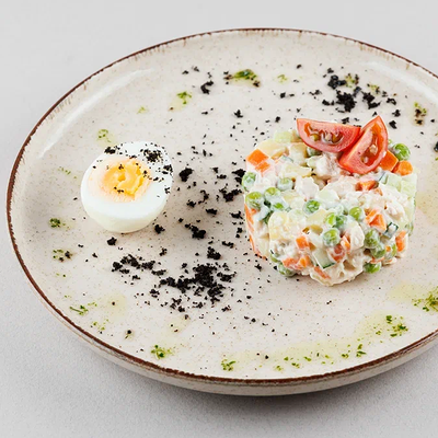 Оливьешка с курочкой и домашним майонезом в Василек по цене 240 ₽