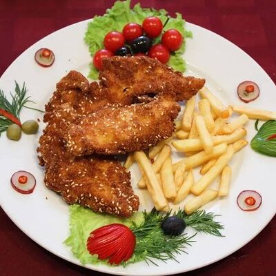 Курица в кунжуте в Старая Сербия по цене 630 ₽