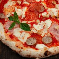 Четыре мяса в Storia Pizza